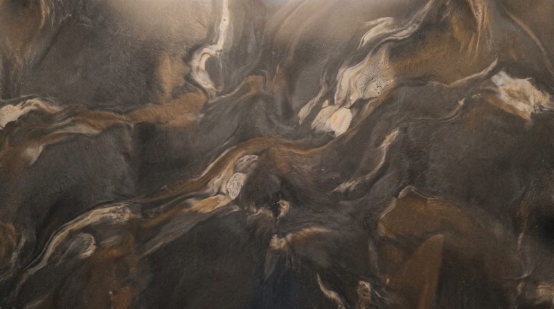 Marbled metallic epoxy finish detail.